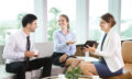 Business People Sitting in Modern Office