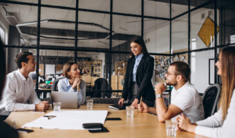 Group of people working out business plan in an office